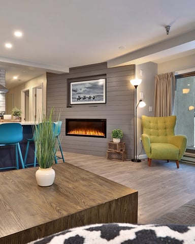 Interior of a vacation condo in Killington, Vermont, decorated in pastel colors.